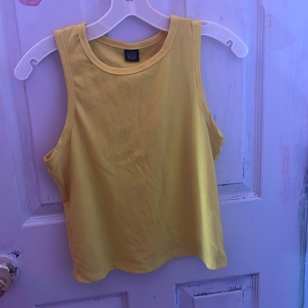 A yellow tank top